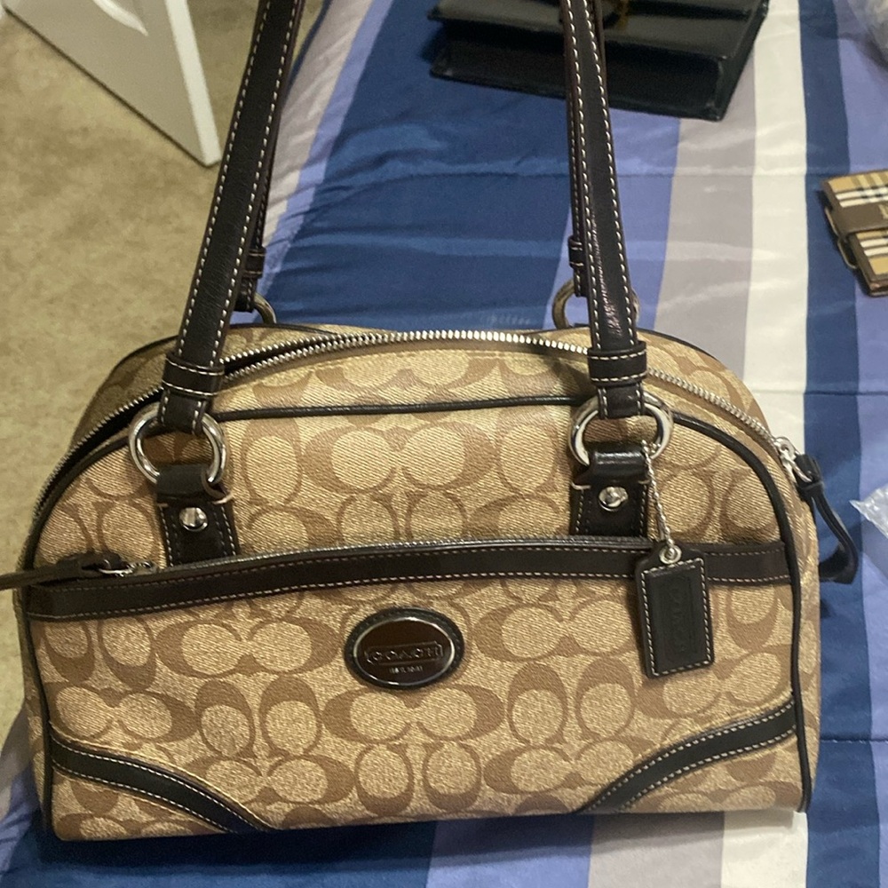 Coach Hand Bag like new only used 3 times. No call outs